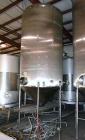 Used Apache Tank, 6500 Gallon, 316 Stainless Steel, Vertical. Approximate 102” diameter x 172” straight side. Dished top, 70” coned bottom. Side entering agitator with a 3 blade prop, driven by a 3hp...