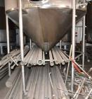 Used Apache Tank, 6500 Gallon, 316 Stainless Steel, Vertical. Approximate 102” diameter x 172” straight side. Dished top, 70” coned bottom. Side entering agitator with a 3 blade prop, driven by a 3hp...
