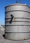 Used Blaw Knox Tank, 11,800 Gallon, 304 Stainless Steel, Vertical. Approximate 144” diameter x 168” straight side, dished top, flat bottom. (1) Turn of internal pipe coil on bottom. Openings top 1” (...