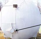 Used Cherry Burrell Horizontal Tank, 30,000 Gallon, Model CH. Height 13', length 38', 3
