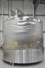 Used Cherry Burrell 6,000 Gallon Top Agitated Mixing Tank, Model CV.  Top agitated stainless steel single wall mixing tank with top agitator (missing shaft and propeller).  Includes dual CIP spray ba...