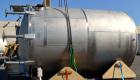 Used Cherry-Burrell Type C Tank, 10,000 Gallon, 304 Stainless Steel, Vertical. 126” Diameter x 172” straight side, dished top and bottom. Bottom side entering agitator with a 3 blade prop, driven by ...