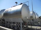 Used Cherry Burrell 10,000 Gallon Stainless Steel Horizontal Storage Tank. Approximately 10'6