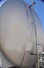 Used Cherry Burrell 10,000 Gallon Stainless Steel Horizontal Storage Tank. Approximately 10'6