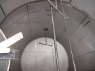 Used Cherry Burrell 10,000 Gallon Stainless Steel Horizontal Storage Tank. Approximately 10'6