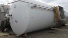 Used Cherry-Burrell Tank, 9000 Gallon, Model SVW, Stainless Steel, Vertical. Dished top, flat bottom. Jacketed on side bottom. Side bottom mounted prop style agitator, side bottom man way. Insulated ...