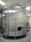 Used Cherry Burrell 8000 Gallon Vertical Stainless Steel Tank.Top mounted agitator, side manway, sightglass, 3