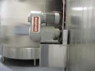 Used Cherry Burrell 8000 Gallon Vertical Stainless Steel Tank.Side mounted 5 hp agitator, side manway, sightglass, 12' diameter x 8'6
