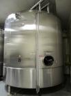 Used Cherry Burrell 8000 Gallon Vertical Stainless Steel Tank.Top mounted agitator, dual impeller, bearing block, side manway, sightglass, 3
