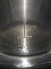 Used Cherry Burrell 8000 Gallon Vertical Stainless Steel Tank.5 Hp side mounted agitator, dual impeller, bearing block, side manway, sightglass, 12' diameter x 8'6