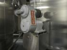 Used Cherry Burrell 8000 Gallon Vertical Stainless Steel Tank.5 Hp side mounted agitator, dual impeller, bearing block, side manway, sightglass, 12' diameter x 8'6