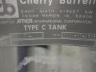 Used Cherry Burrell 8000 Gallon Vertical Stainless Steel Tank.Top mounted agitator, dual impeller, bearing block, side manway, sightglass, 3