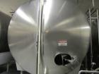 Used Cherry Burrell 8,000 Gallon Horizontal Stainless Steel Tank.  End mount agitator approximately 5 hp.  Manway with cover, sight glass, 8 legs.  Approximately 10' diameter x 12' straight side, 17'...