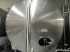 Used-Cherry Burrell 8,000 Gallon Horizontal Stainless Steel Tank.  End mount agitator approximately 5 hp.  Manway with cover...