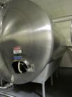Used Cherry Burrell 8,000 Gallon Horizontal Stainless Steel Tank.  End mount agitator approximately 5 hp.  Manway with cover, sight glass, 8 legs.  Approximately 10' diameter x 12' straight side, 17'...