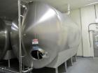 Used Cherry Burrell 8,000 Gallon Horizontal Stainless Steel Tank.  End mount agitator approximately 5 hp.  Manway with cover, sight glass, 8 legs.  Approximately 10' diameter x 12' straight side, 17'...