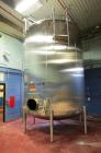 Used 8000 Gallon Stainless Steel Cherry Burrell Top Agitated Mix Tank. 