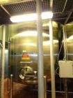 Used 8000 Gallon Stainless Steel Cherry Burrell Top Agitated Mix Tank. 