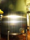 Used- 8000 Gallon Stainless Steel Cherry Burrell Top Agitated Mix Tank. 