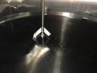 Used- 8000 Gallon Stainless Steel Cherry Burrell Top Agitated Mix Tank. 