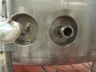 Used 10,000 Gallon Cherry Burrell Stainless Steel Jacketed Mix Tank. 316L SS contact parts with T304 SS exterior parts. Dimensions 136
