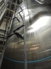 Used 10,000 Gallon Cherry Burrell Stainless Steel Jacketed Mix Tank. 316L SS contact parts with T304 SS exterior parts. Dimensions 136