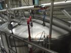 Used 10,000 Gallon Cherry Burrell Stainless Steel Jacketed Mix Tank. 316L SS contact parts with T304 SS exterior parts. Dimensions 136