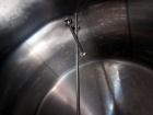 Used Cherry-Burrell Storage Tank, 5000 Gallon, 304 Stainless Steel, Horizontal. 120” Diameter x 84” straight side, dished heads. Insulated with carbon steel sheathing. Channel jacket on partial botto...