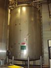 Used Mueller 6000 Gallon Stainless Steel Mix Tank. Model F 6000. Approx. 9' Diameter x 12' Straight Side. Dished Heads. Side 16
