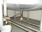 Used Mueller 6000 Gallon Stainless Steel Mix Tank. Model F 6000. Approx. 9' Diameter x 12' Straight Side. Dished Heads. Side 16