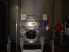 Used Cherry Burrell 10,000 gallon stainless steel storage tank. Approx. 10'6
