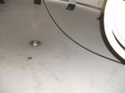Used Cherry Burrell 10,000 gallon stainless steel storage tank. Approx. 10'6