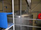 Used Cherry Burrell 10,000 gallon stainless steel storage tank. Approx. 10'6