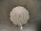 Used Cherry Burrell 10,000 gallon stainless steel storage tank. Approx. 10'6