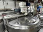 Used 6,000 Gallon 316 Stainless Steel Jacketed & Double Motion Agitated Tank with scraper agitation and center agitation with turbine blade paddles. Jacket rated for 100 PSI at 350 degrees Fahrenheit...