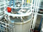 USED: Chicago Boiler tank, 6000 gallon, 316 stainless steel, vertical. Approximately 96