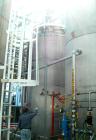 USED: Chicago Boiler tank, 6000 gallon, 316 stainless steel, vertical. Approximately 96