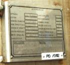 USED: Chicago Boiler tank, 6000 gallon, 316 stainless steel, vertical. Approximately 96