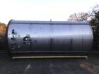 Used 6,000 Gallon Stainless Steel Storage Tank. Approximately 98'' diameter x 16' straight wall, side manhole. Inlets 2 - 3'' threaded 2 - 1.5'' threaded. Outlets 3'' threaded.