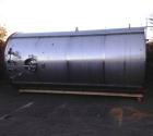 Used 6,000 Gallon Stainless Steel Storage Tank. Approximately 98'' diameter x 16' straight wall, side manhole. Inlets 2 - 3'' threaded 2 - 1.5'' threaded. Outlets 3'' threaded.