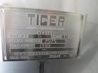 Used 6,000 Gallon Stainless Steel Storage Tank. Approximately 98'' diameter x 16' straight wall, side manhole. Inlets 2 - 3'' threaded 2 - 1.5'' threaded. Outlets 3'' threaded.
