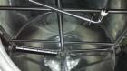Used Crepaco 6000 Gallon Jacketed Tank with Scrape Agitation. Stainless steel cone bottom tank. Sweep scrape agitated, driven by a 5 HP Motor.  Jacket rated 158 PSI at 100 degrees F. Approximate ship...