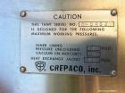 Used Crepaco Tank, 9000 Gallon, 304 Stainless Steel, Vertical. Dished top, flat bottom. Jacketed on side bottom. Side bottom mounted prop style agitator, side bottom man way. Insulated with carbon st...