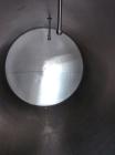 Used Custom Metalcraft Tank, 5000 Gallon, 304 Stainless Steel, Horizontal. Approximately 96” diameter x 144” straight side, dished heads.  Openings: top 3”, (2) 1-1/2”, 2”, heads 18” manway with cove...