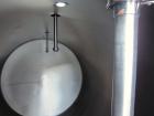 Used Custom Metalcraft Tank, 5000 Gallon, 304 Stainless Steel, Horizontal. Approximately 96” diameter x 144” straight side, dished heads.  Openings: top 3”, (2) 1-1/2”, 2”, heads 18” manway with cove...