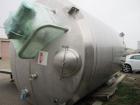 Used DCI Insulated Stainless Steel Mixing Tank, 6,000 Gallon.  Top agitated, flat bottom, stainless steel, top manway and 1 spray ball.  4 Top inlets:  (2) 5