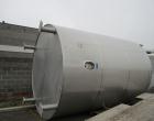 Used DCI Insulated Stainless Steel Mixing Tank, 6,000 Gallon.  Top agitated, flat bottom, stainless steel, top manway and 1 spray ball.  4 Top inlets:  (2) 5