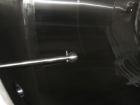 Used DCI Insulated Stainless Steel Mixing Tank, 6,000 Gallon.  Top agitated, flat bottom, stainless steel, top manway and 1 spray ball.  4 Top inlets:  (2) 5