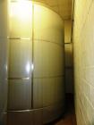 Used 10,000 Stainless Steel Single Shell Mixing Tank. Domed top, sloped bottom mixing tank with vent on top, bottom side manway, bottom side 6.25 hp agitator with 155 final rpm mixer. 12' diameter x ...