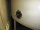 Used 10,000 Gallon Mixing Tank with Vent on Top Dish. Top and bottom electrically heated (previously used for liquid sugar).  Bottom side manway, bottom side agitator 6.25hp, Reuland motor. 11'-6